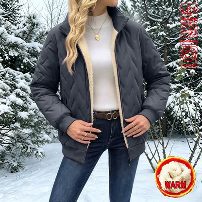 Women's winter jacket with a stand-up collar – thickly padded jacket with a zipper, long sleeves, and pockets.