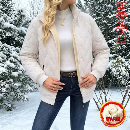 Women's winter jacket with a stand-up collar – thickly padded jacket with a zipper, long sleeves, and pockets.